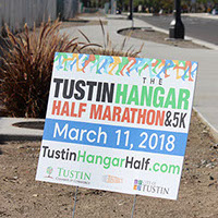street sign advertisement for event